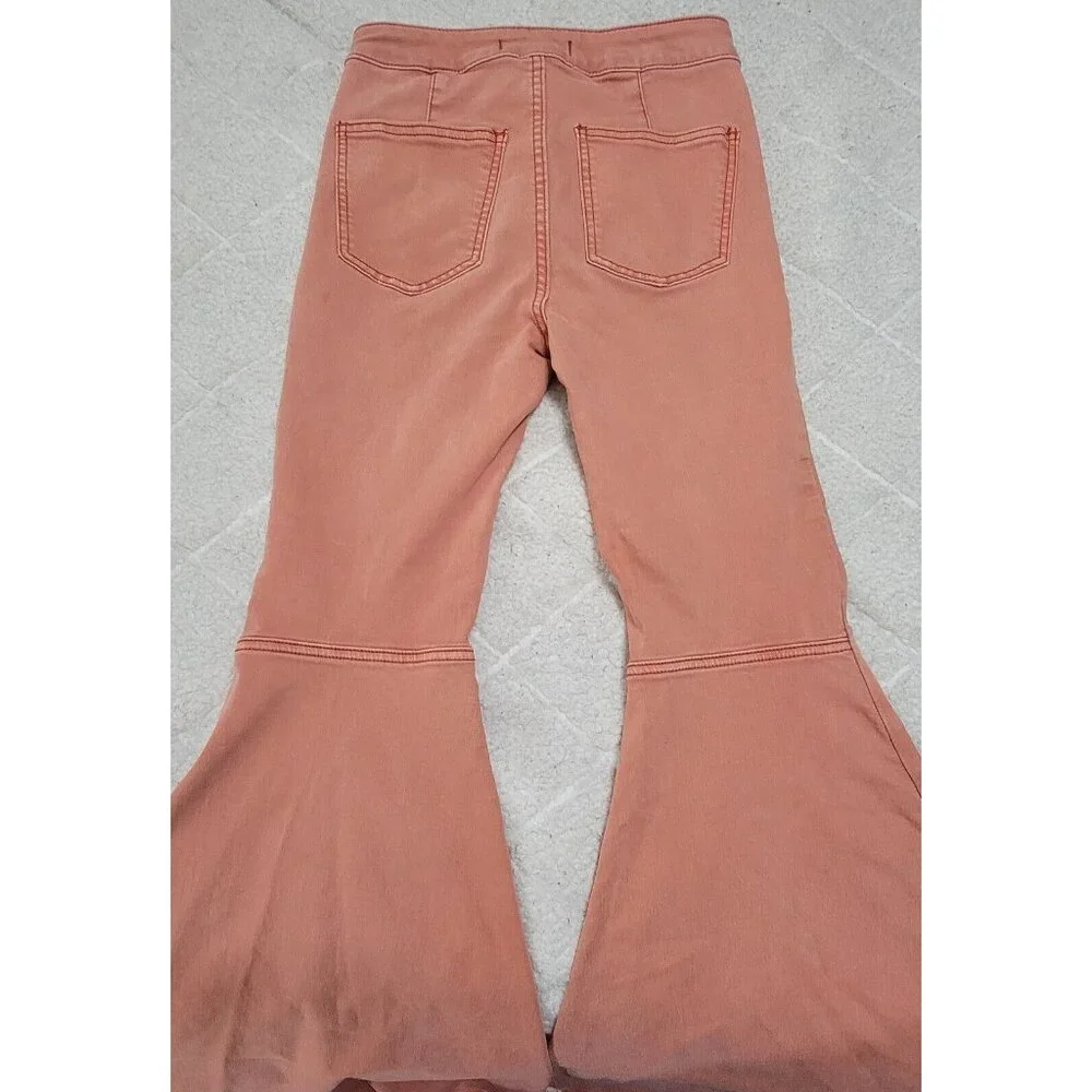Free People Women's Pink Float‎ On Flared Leg Denim Jeans Raw Hem Size W25